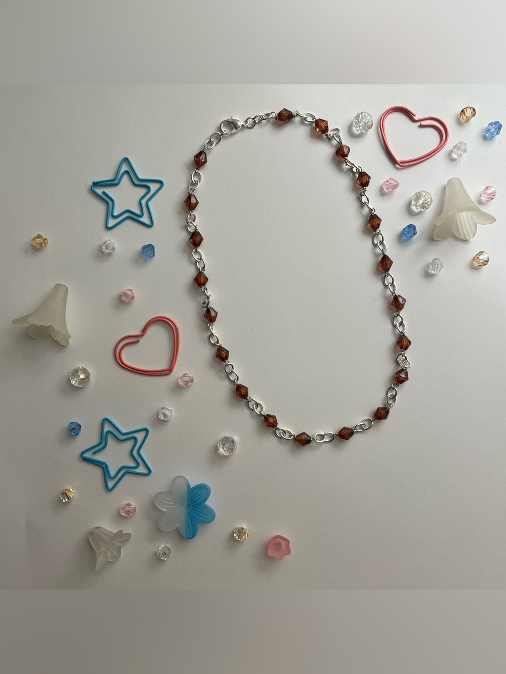 Silver chain necklace with brown beads